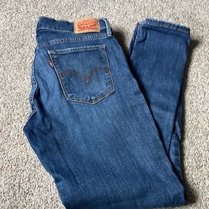 Levi’s 710 super skinny distressed jeans with zip front and multiple pockets